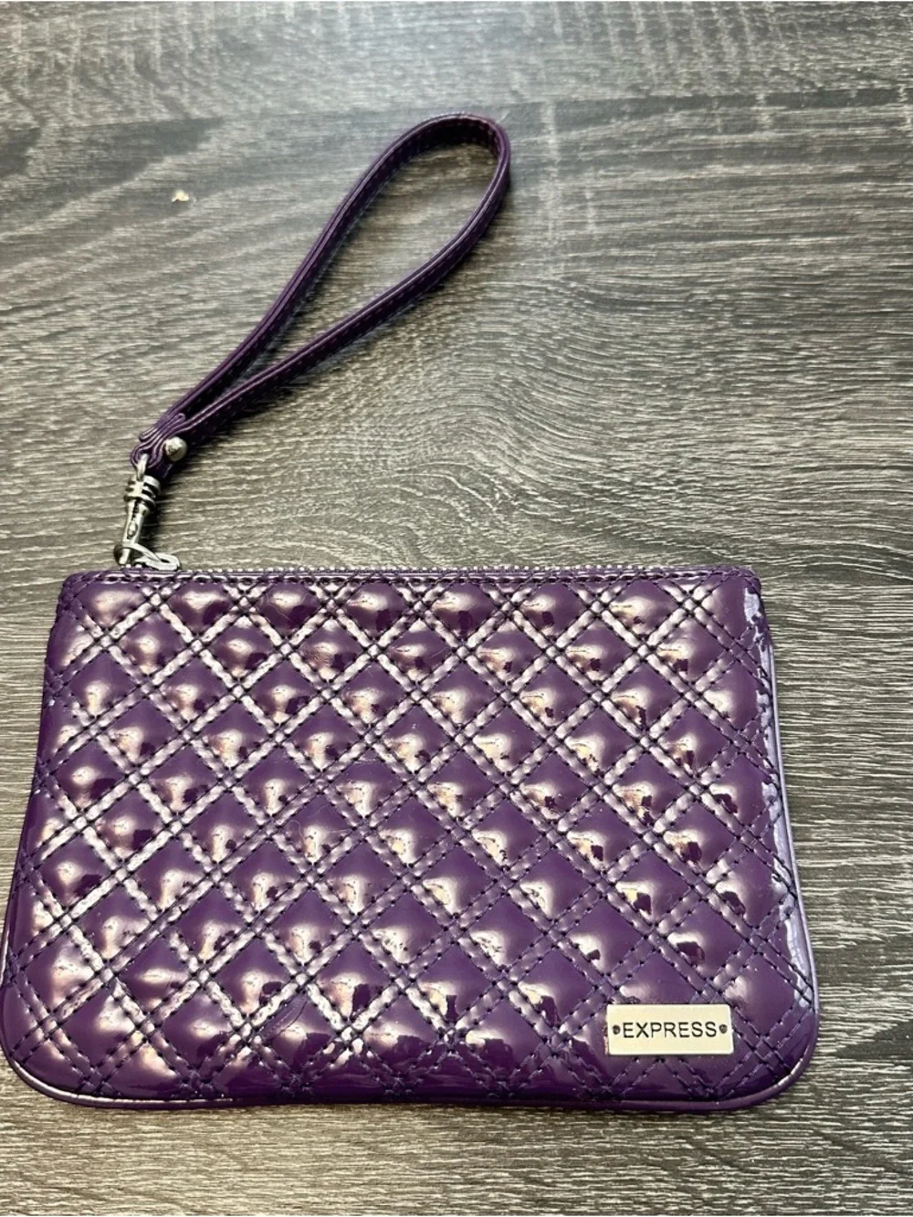 Women’s Express purple wristlet‎